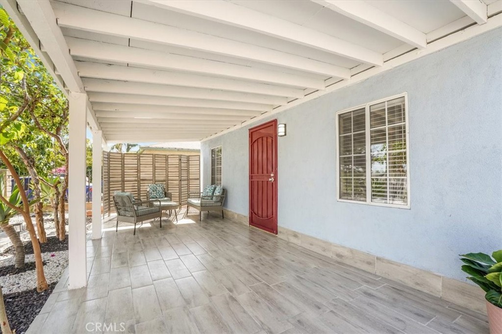 13737 Mercer Street Pacoima, CA 91331 - Photo 4 of 35 a living room with furniture and a large window