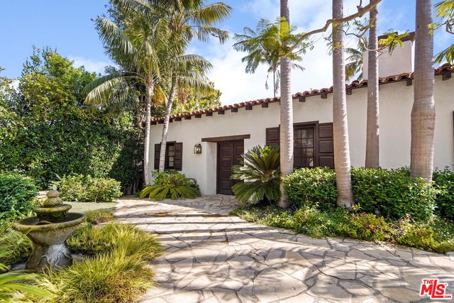 a view of a house with a street