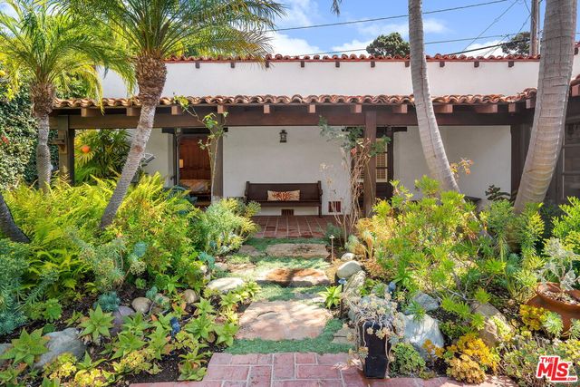 a picture of a bathroom with a shower
