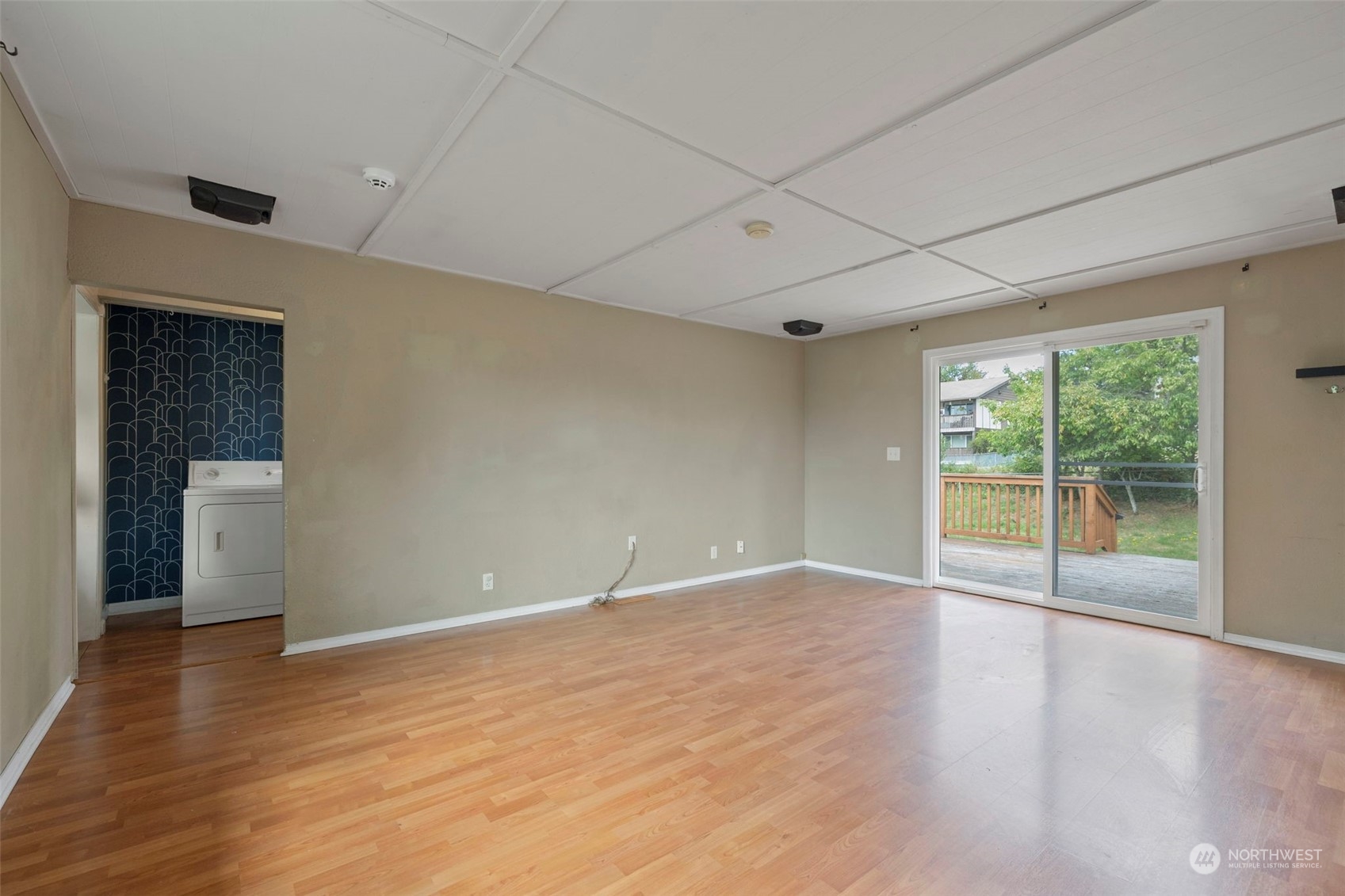 2042 East 18th Street Bremerton, WA 98310 - Photo 13 of 33 a view of an empty room with wooden floor and a window