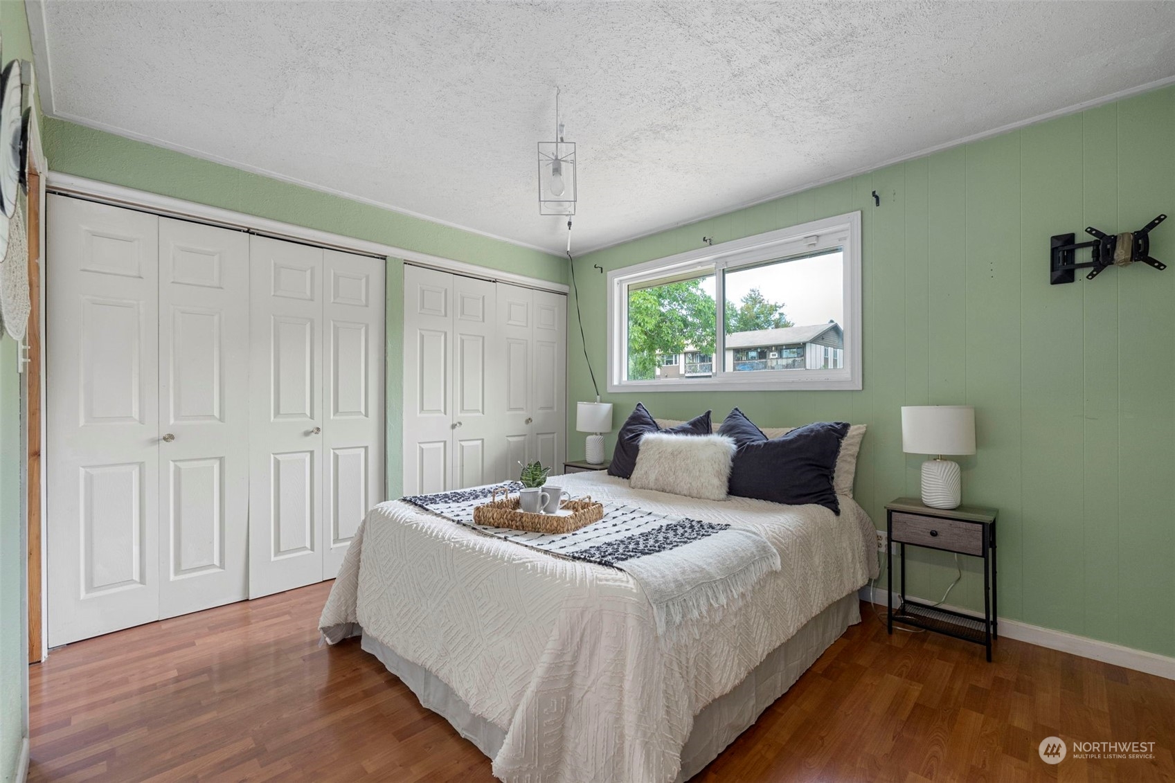 2042 East 18th Street Bremerton, WA 98310 - Photo 14 of 33 a bedroom with a bed and a window