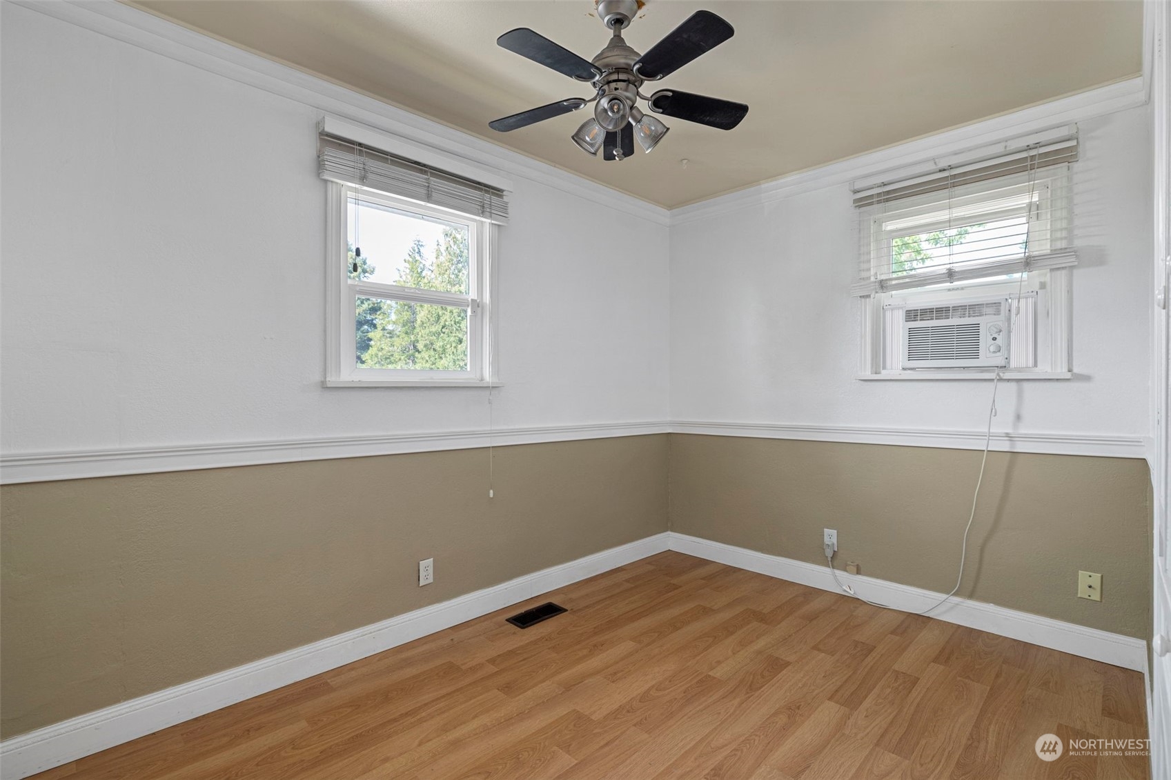 2042 East 18th Street Bremerton, WA 98310 - Photo 19 of 33 a view of a room with wooden floor and windows