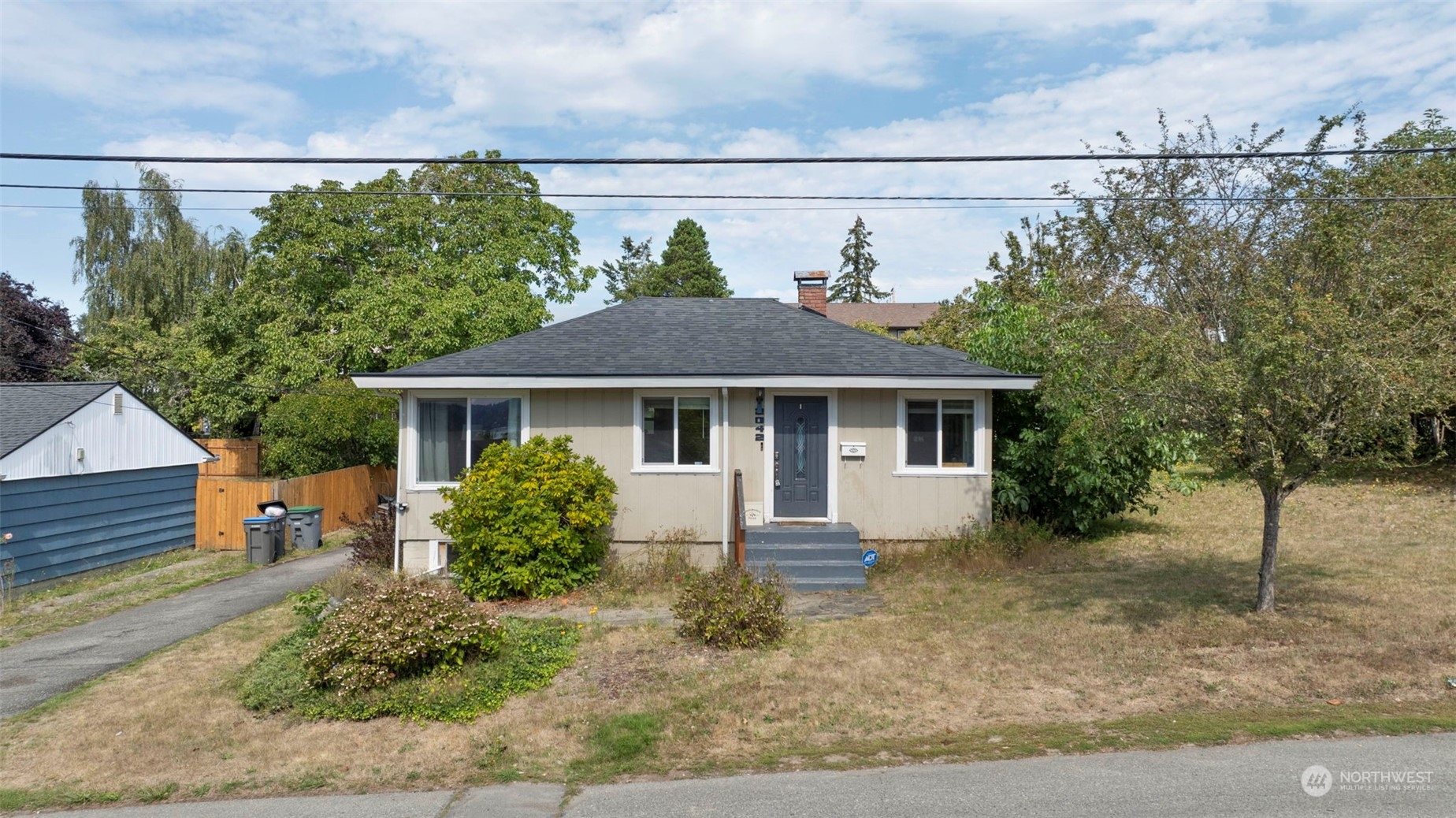 2042 East 18th Street Bremerton, WA 98310 - Photo 3 of 33 a front view of a house with a yard