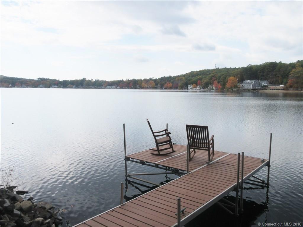 a view of a lake with sitting area