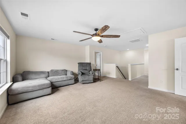 a view of storage and utility room with washer and dryer
