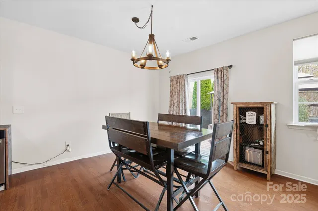 a bathroom with a double vanity sink mirror and toilet