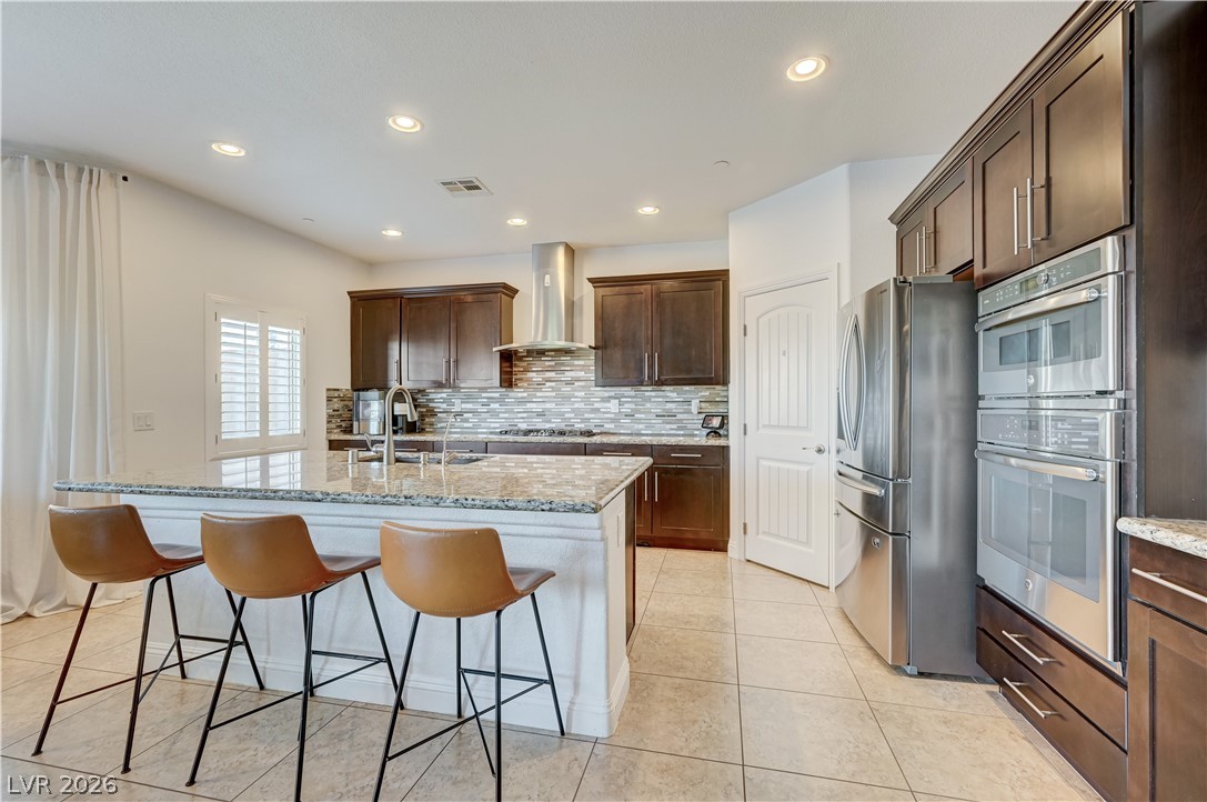 176 Kirkton Street Henderson, NV 89012 - Photo 20 of 80 Walk-in pantry providing exceptional storage space