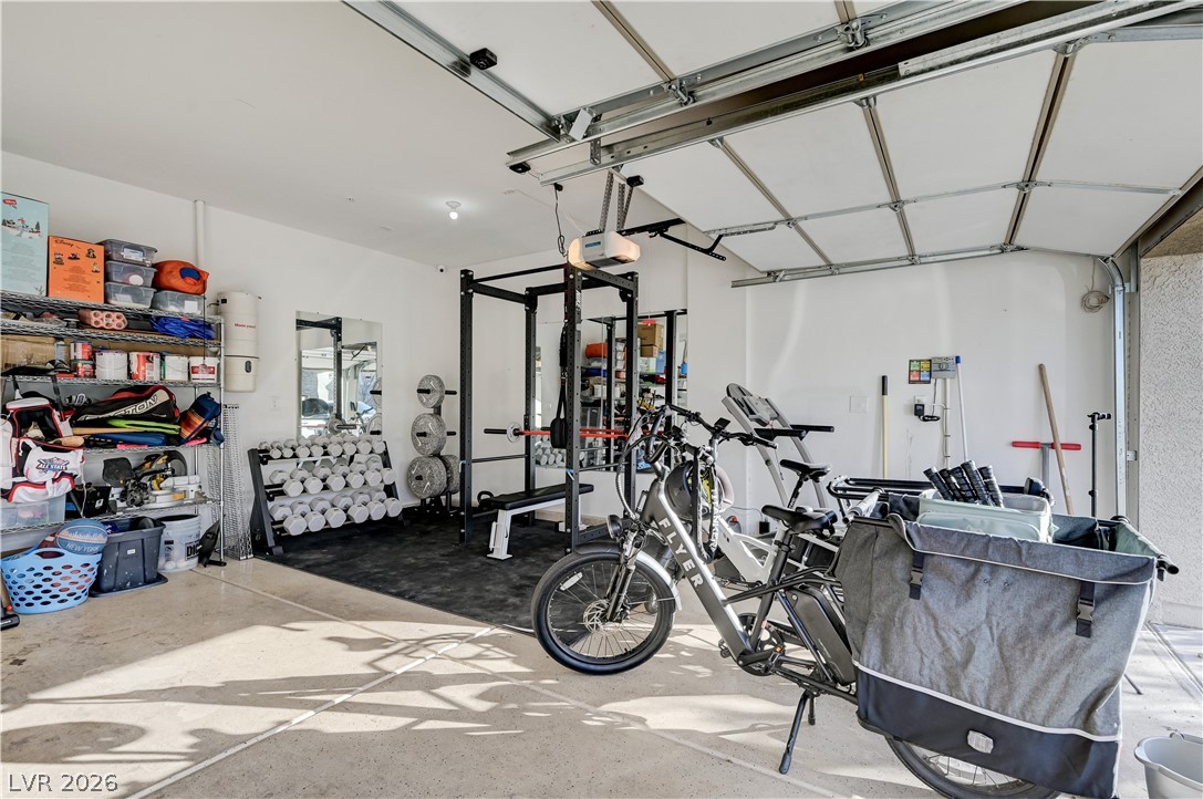 176 Kirkton Street Henderson, NV 89012 - Photo 53 of 80 Three-car garage offering excellent parking and storage flexibility