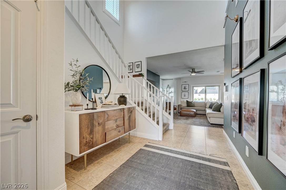 176 Kirkton Street Henderson, NV 89012 - Photo 7 of 80 Bright, airy foyer designed to impress guests upon arrival