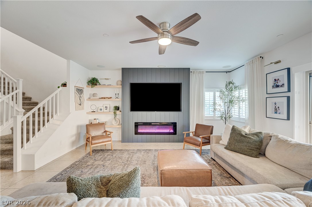 176 Kirkton Street Henderson, NV 89012 - Photo 10 of 80 Light-filled living space with expansive ceilings enhancing openness