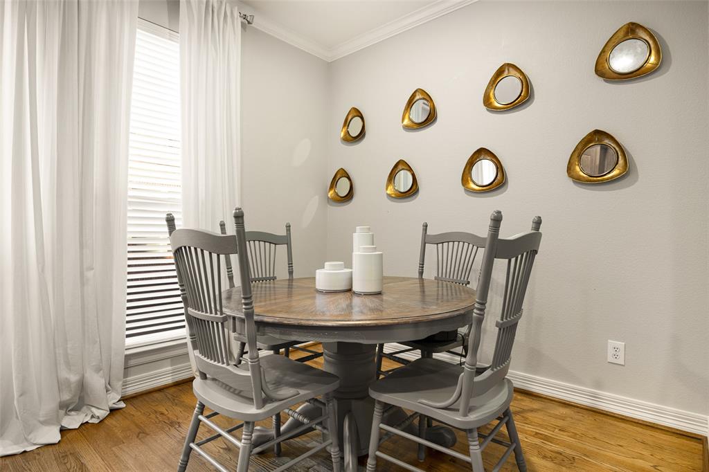 3610 Gillespie Street, Unit 6 Dallas, TX 75219 - Photo 16 of 27 a view of a dining room with furniture and a window