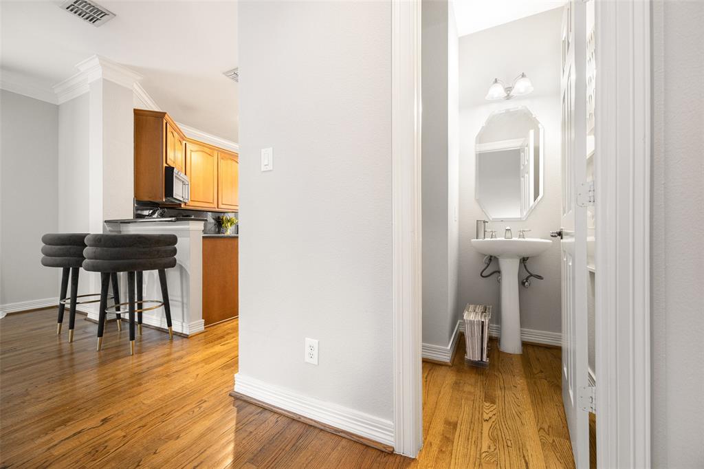3610 Gillespie Street, Unit 6 Dallas, TX 75219 - Photo 8 of 27 a view of a livingroom with furniture and hardwood floor
