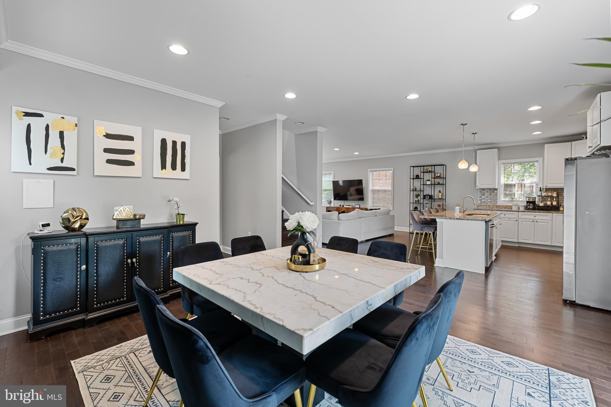 3327 5th Street Southeast Washington, DC 20032 - Photo 16 of 42 a view of a dining room with furniture and wooden floor