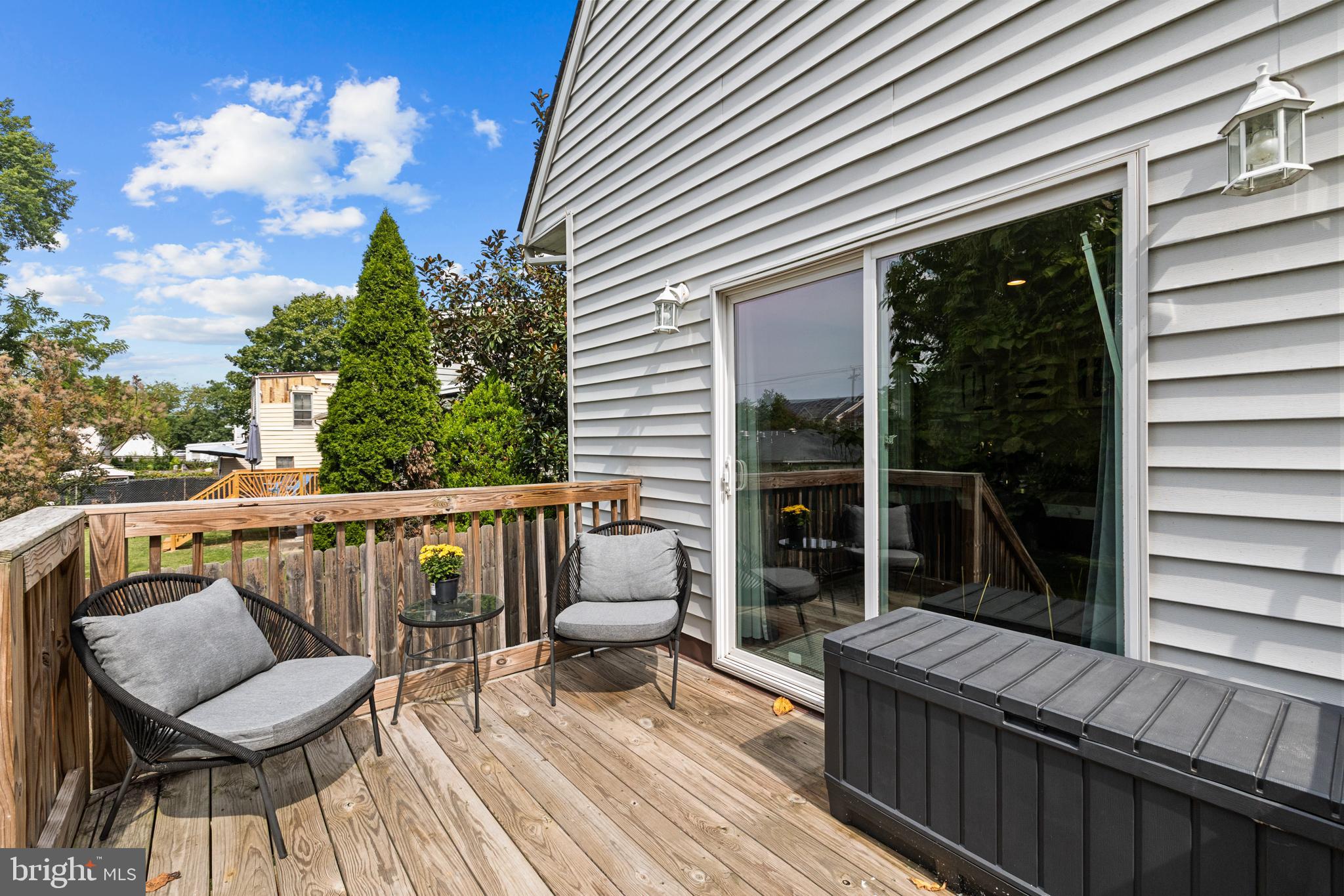 3327 5th Street Southeast Washington, DC 20032 - Photo 18 of 42 a view of balcony with wooden floor and outdoor seating