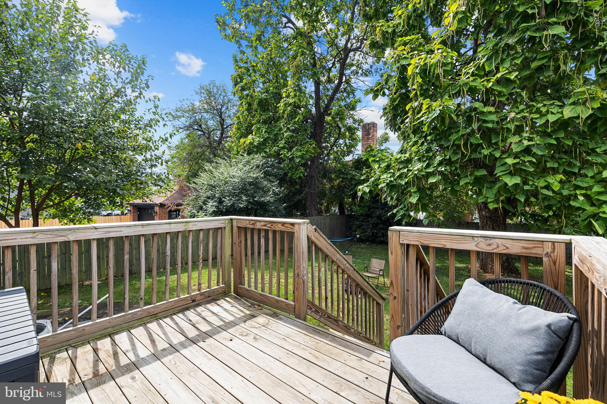 3327 5th Street Southeast Washington, DC 20032 - Photo 19 of 42 a view of balcony with wooden floor and outdoor seating