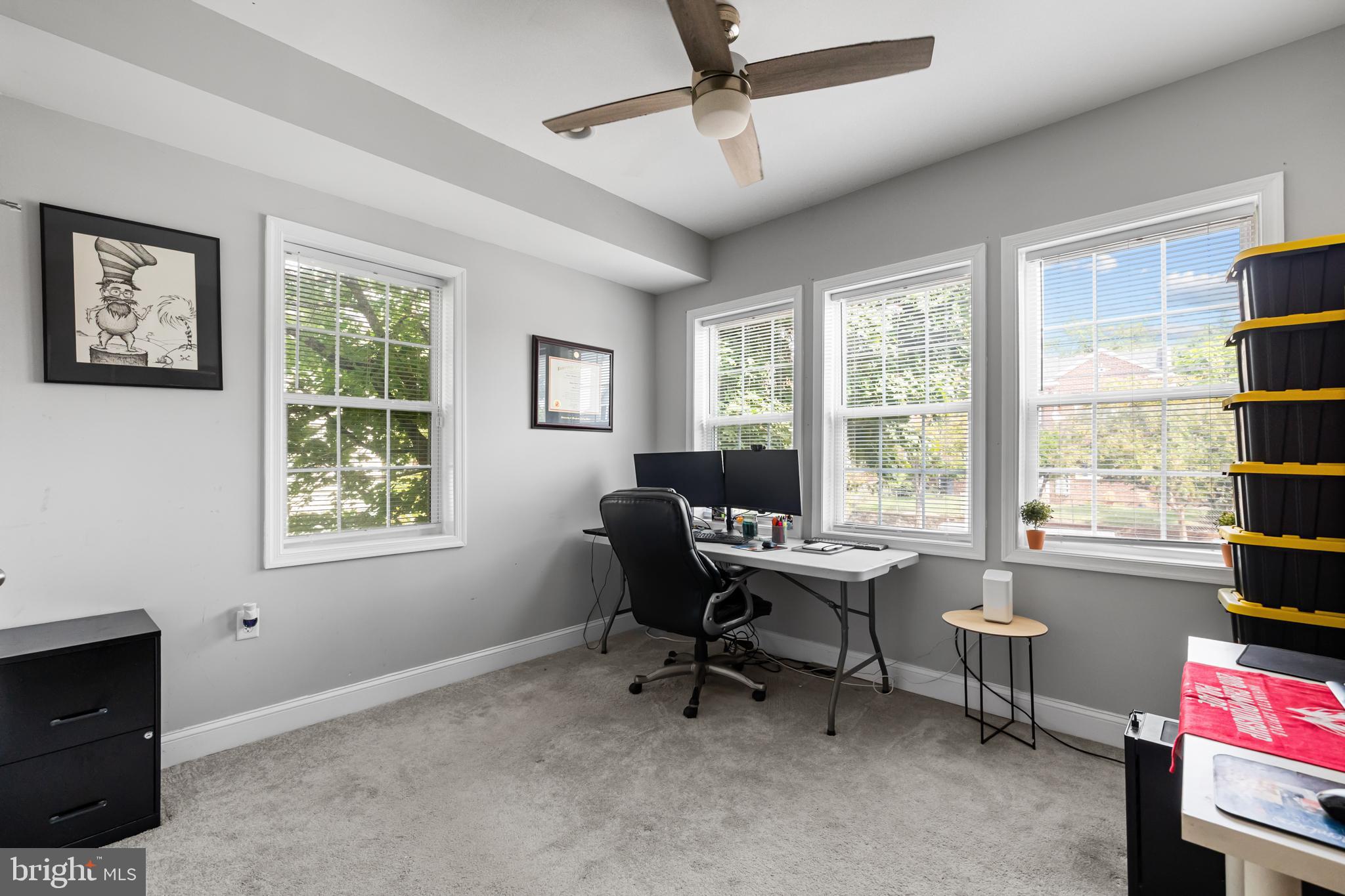3327 5th Street Southeast Washington, DC 20032 - Photo 20 of 42 a view of a workspace with furniture and a window