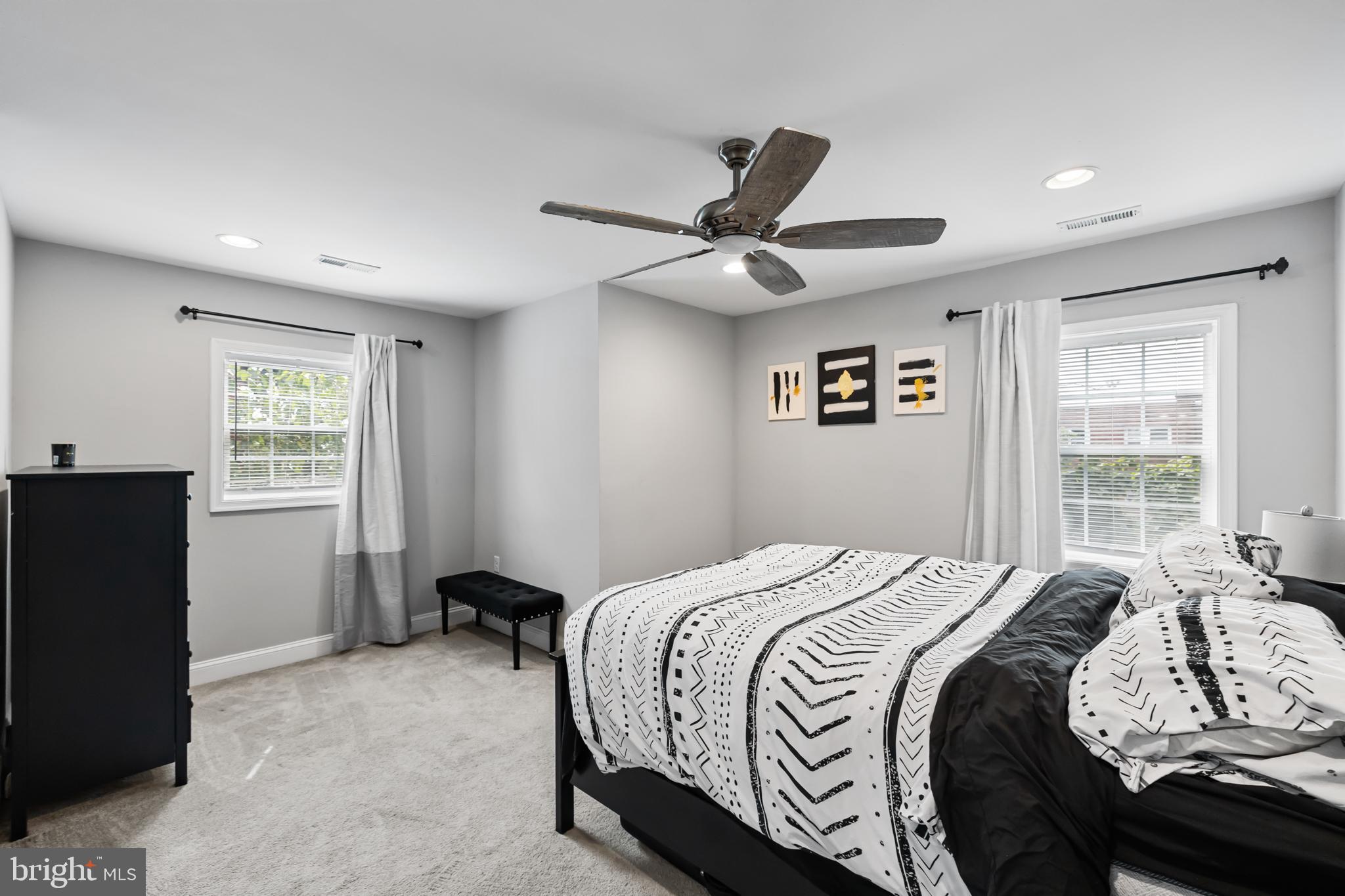 3327 5th Street Southeast Washington, DC 20032 - Photo 26 of 42 a bedroom with a bed and a window