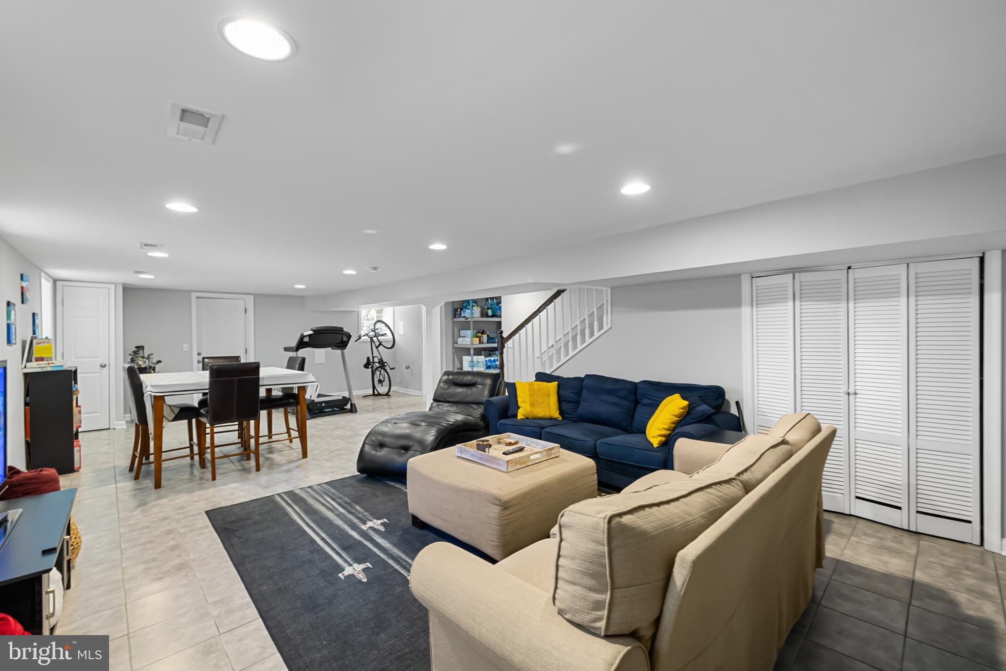 3327 5th Street Southeast Washington, DC 20032 - Photo 36 of 42 a living room with furniture and a table