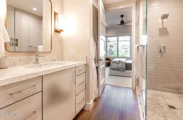 a living room with furniture fireplace and flat screen tv