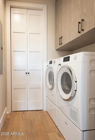 a kitchen with a dining table and chairs