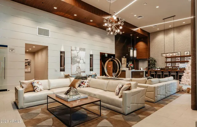 a view of a swimming pool with a lounge chairs