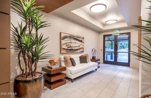 a view of outdoor kitchen with sitting area