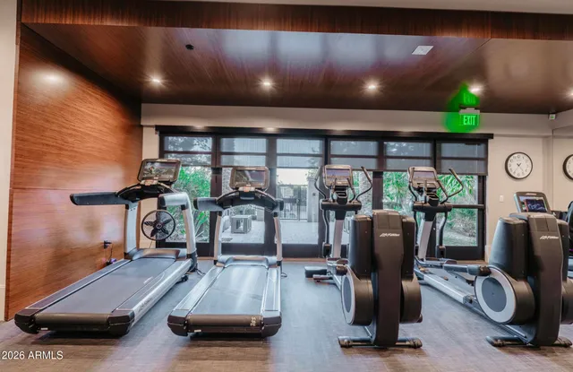 a view of a house with backyard porch and sitting area