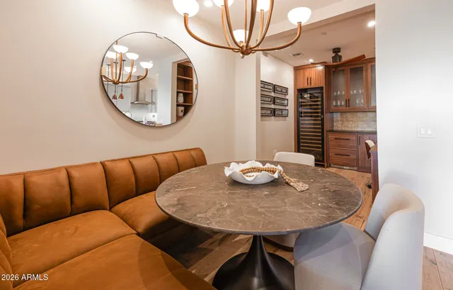 a kitchen with a refrigerator and a stove