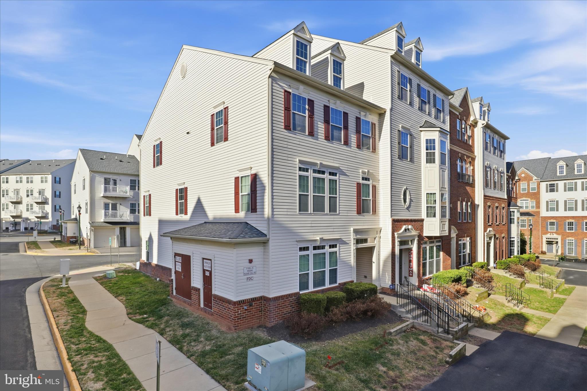 7455 Brunson Circle Gainesville, VA 20155 - Photo 1 of 41 a view of multiple houses with a yard