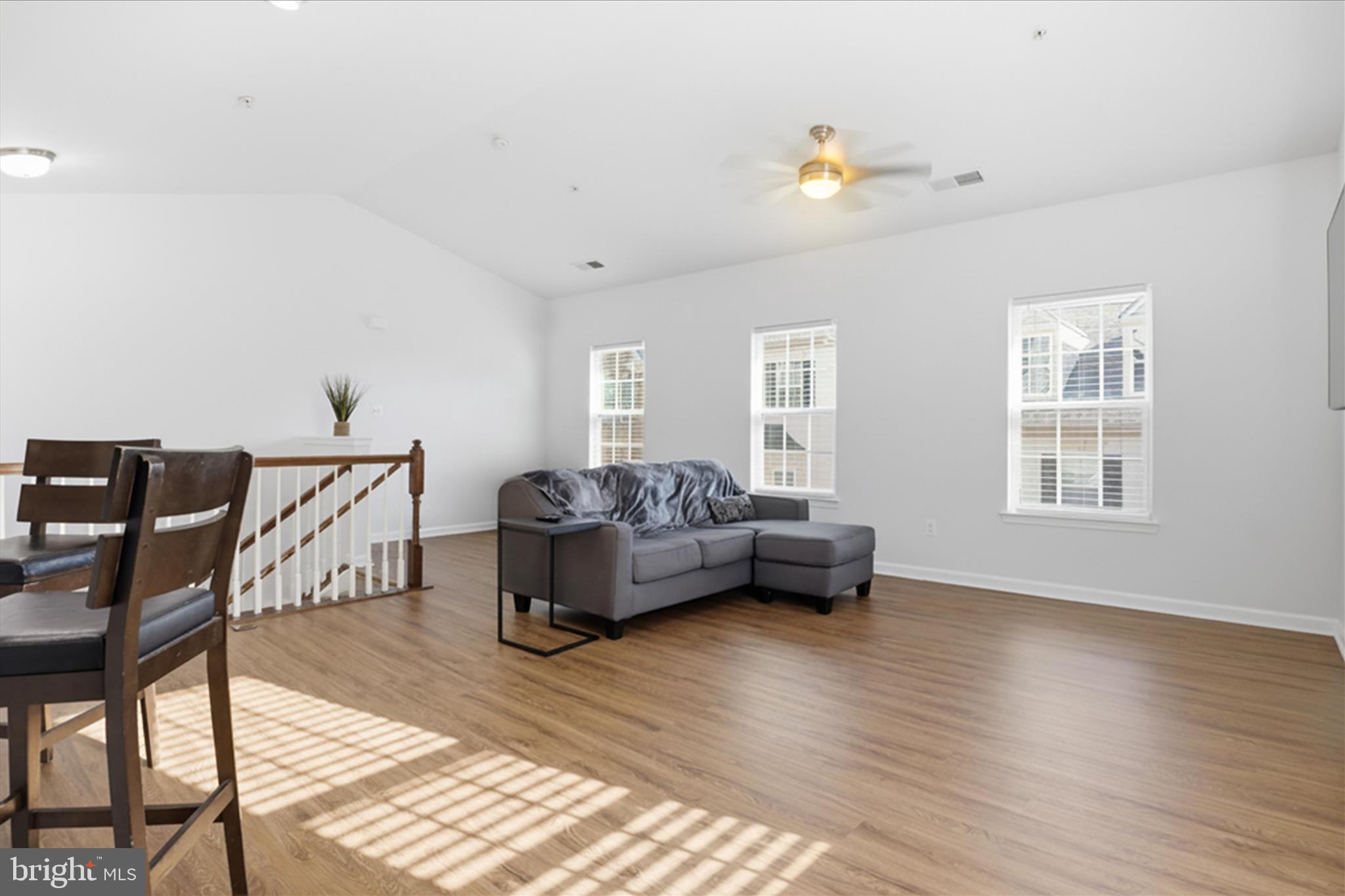 7455 Brunson Circle Gainesville, VA 20155 - Photo 10 of 41 a living room with furniture and a table