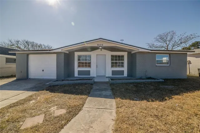 a front view of house with yard