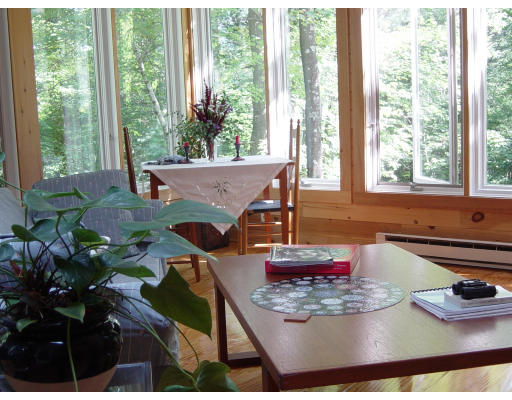 79 Bare Hill Road Bolton, MA 01740 - Photo 12 of 12 a living room with furniture and a large window