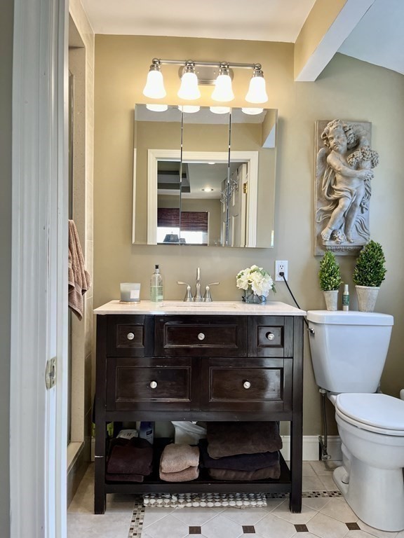 27 Mark Circle Holden, MA 01520 - Photo 17 of 39 a bathroom with a sink and a mirror