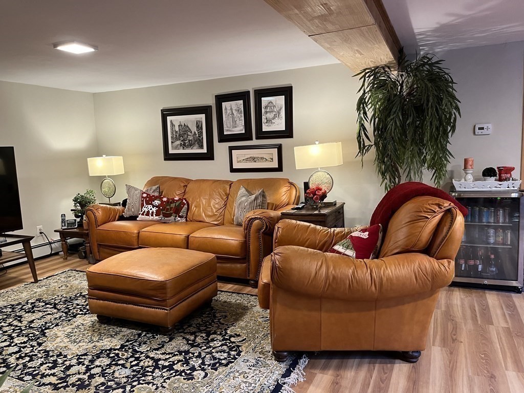 27 Mark Circle Holden, MA 01520 - Photo 24 of 39 a living room with furniture and a lamp