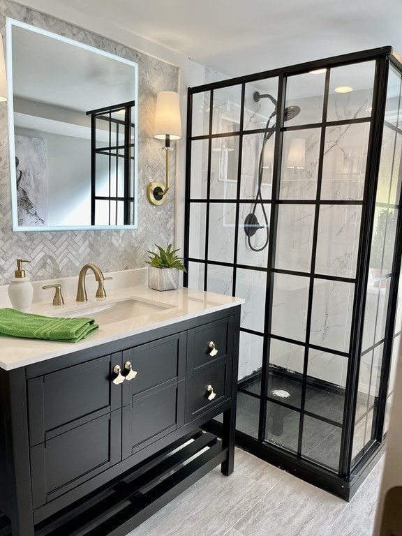 27 Mark Circle Holden, MA 01520 - Photo 27 of 39 a bathroom with a sink and a mirror