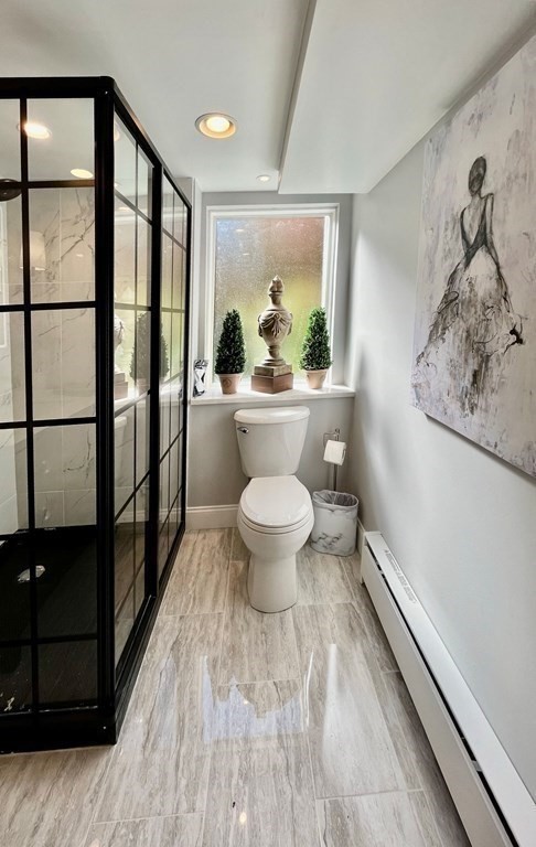 27 Mark Circle Holden, MA 01520 - Photo 28 of 39 a bathroom with a toilet and a shower