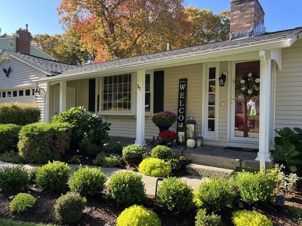 27 Mark Circle Holden, MA 01520 - Photo 3 of 39 front view of a house with potted plants