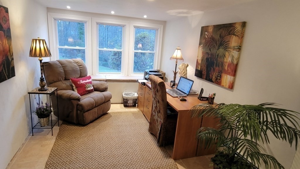 27 Mark Circle Holden, MA 01520 - Photo 35 of 39 a living room with furniture and a window