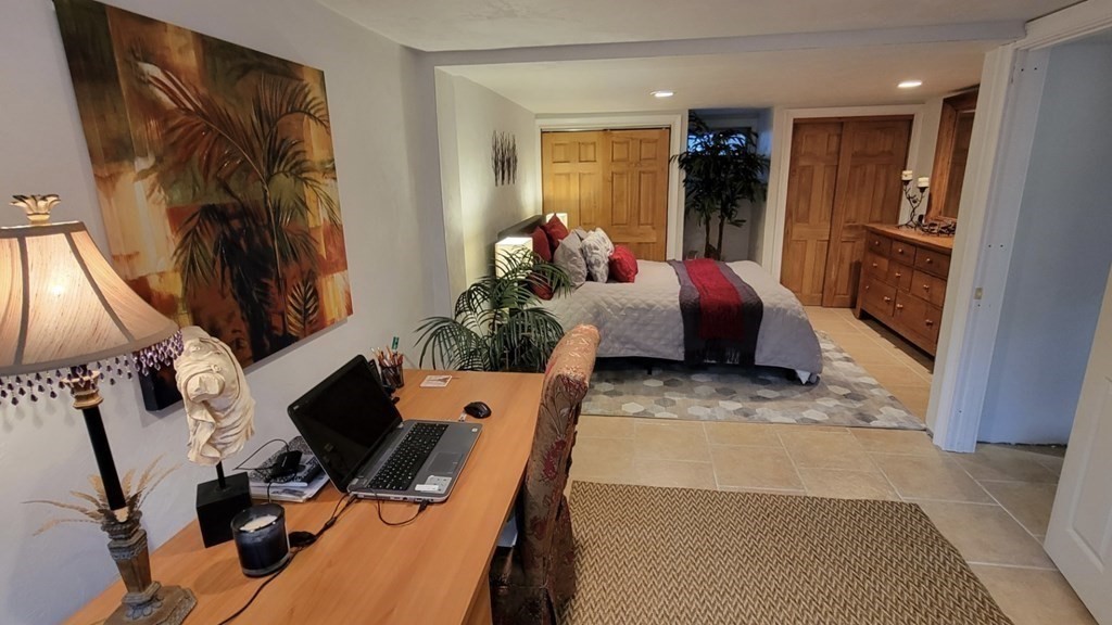 27 Mark Circle Holden, MA 01520 - Photo 36 of 39 a living room with furniture and a flat screen tv