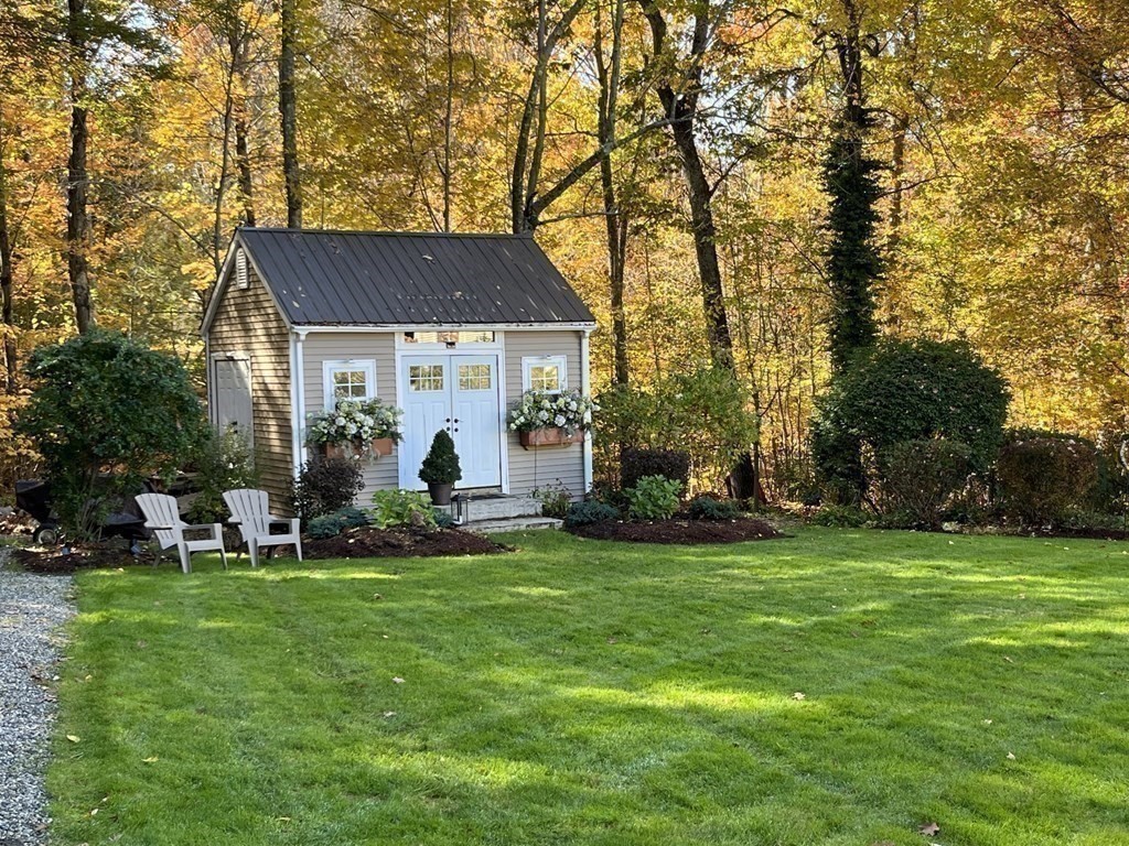 27 Mark Circle Holden, MA 01520 - Photo 37 of 39 a view of a house with a yard porch and sitting area