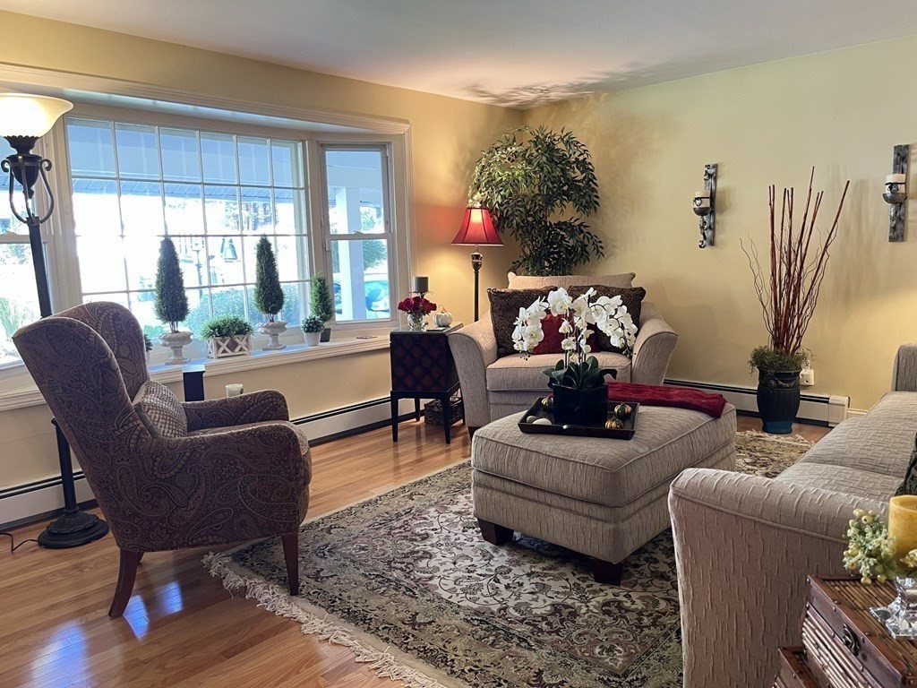 27 Mark Circle Holden, MA 01520 - Photo 5 of 39 a living room with furniture and a large window