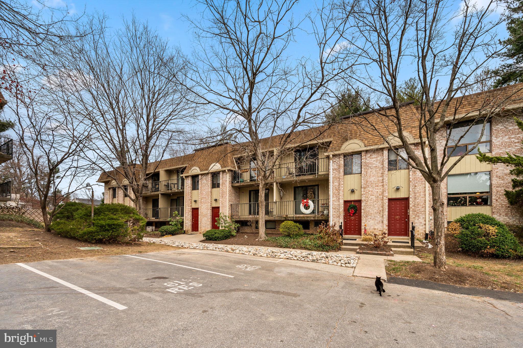 a front view of a building with a street