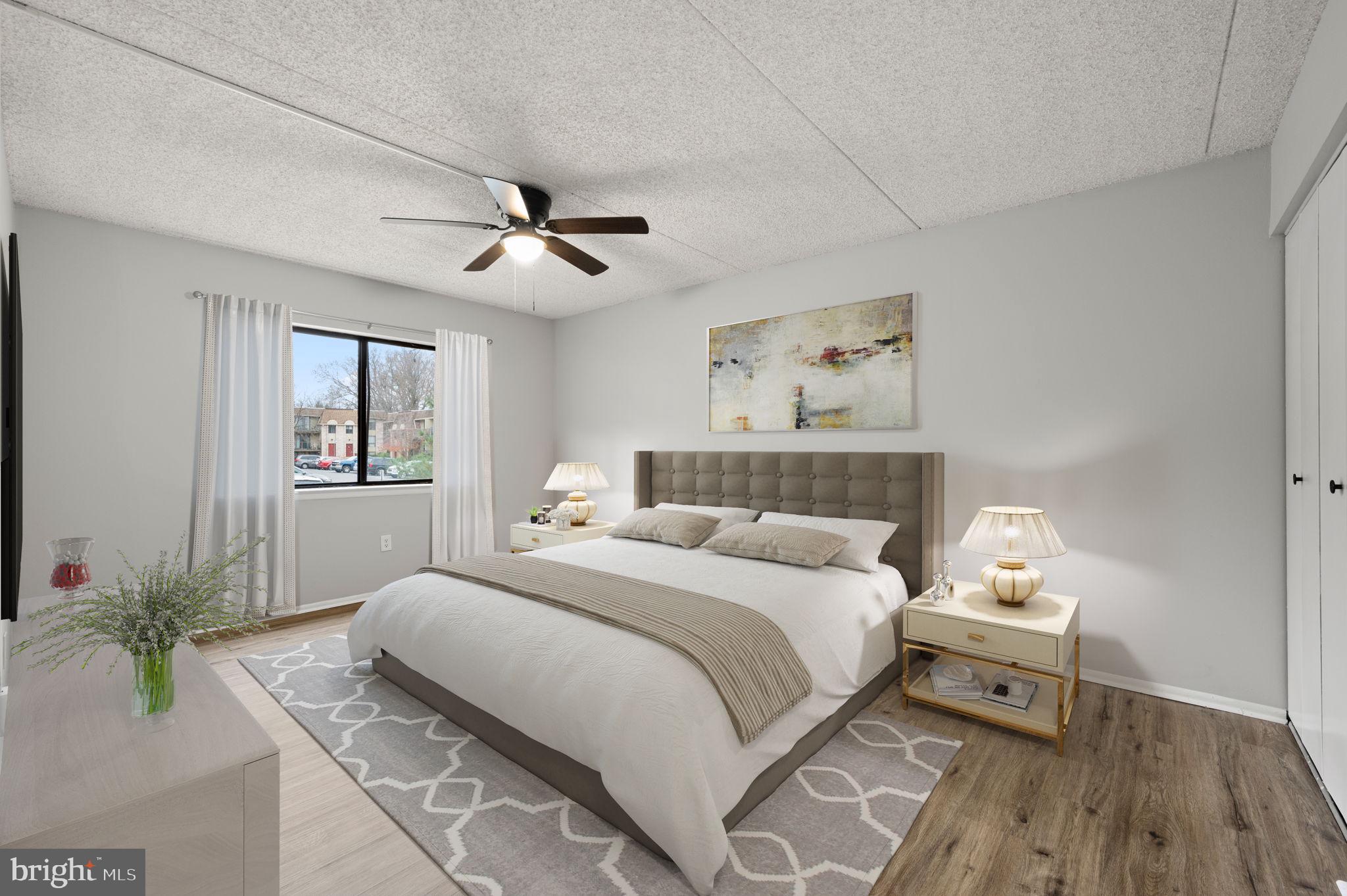 336 Saybrook Lane Wallingford, PA 19086 - Photo 12 of 22 a bedroom with a bed and wooden floor