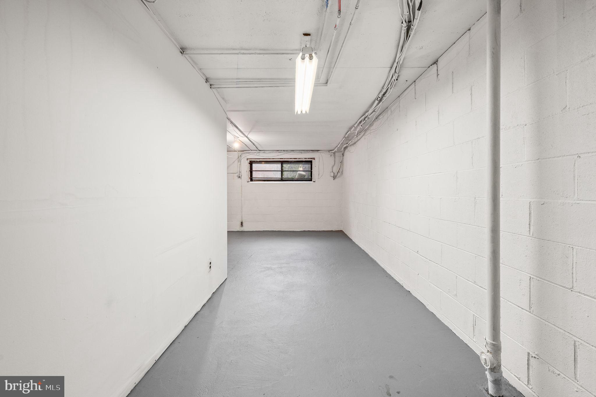 336 Saybrook Lane Wallingford, PA 19086 - Photo 19 of 22 a view of a hallway with a white walls