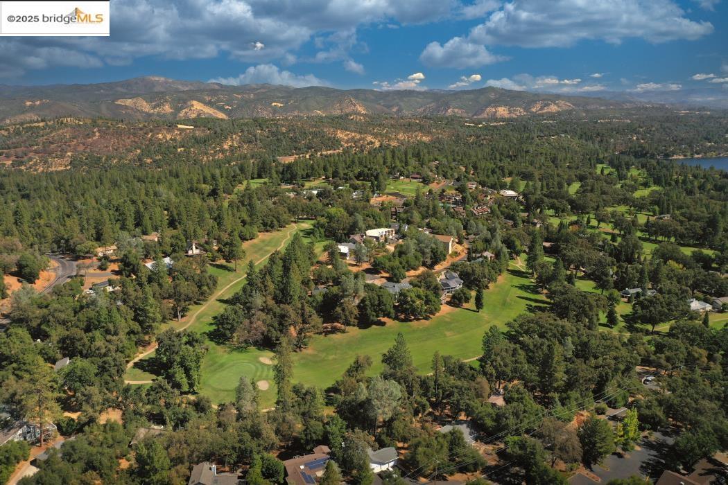 19195 Ferretti Road Groveland, CA 95321 - Photo 48 of 51 Aerial overview of property's location with a mountain backdrop and a local golf course
