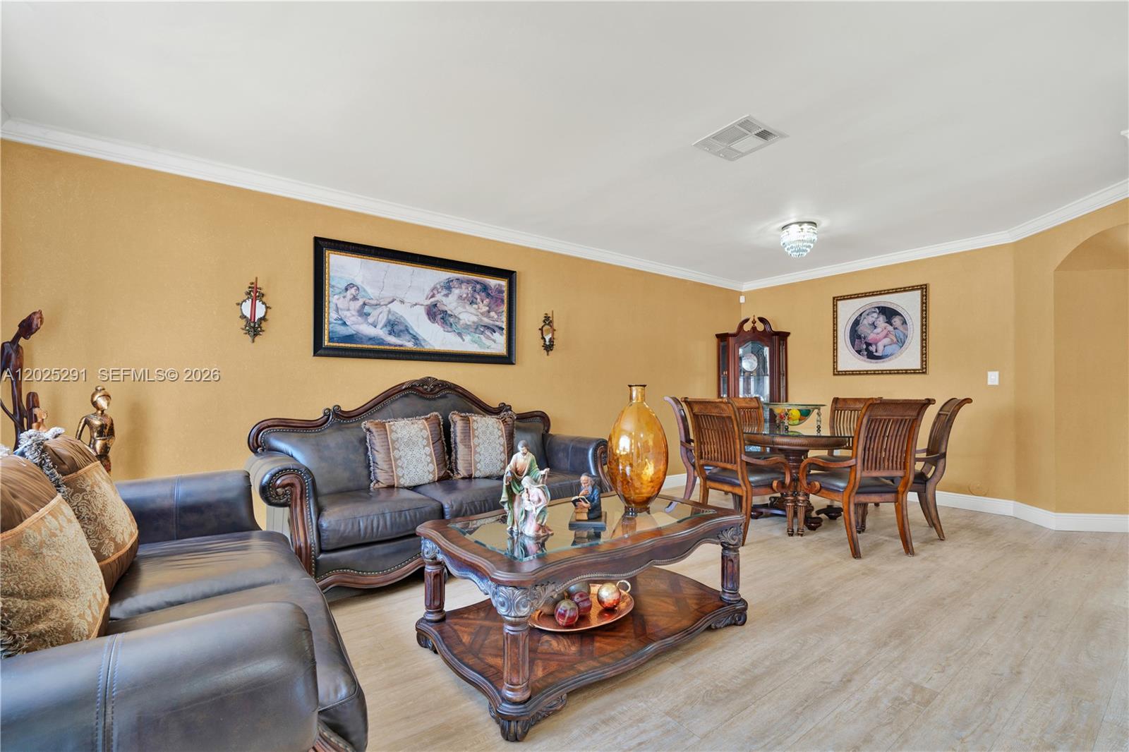 10006 Southwest 162nd Path Miami, FL 33196 - Photo 7 of 40 a living room with furniture and wooden floor