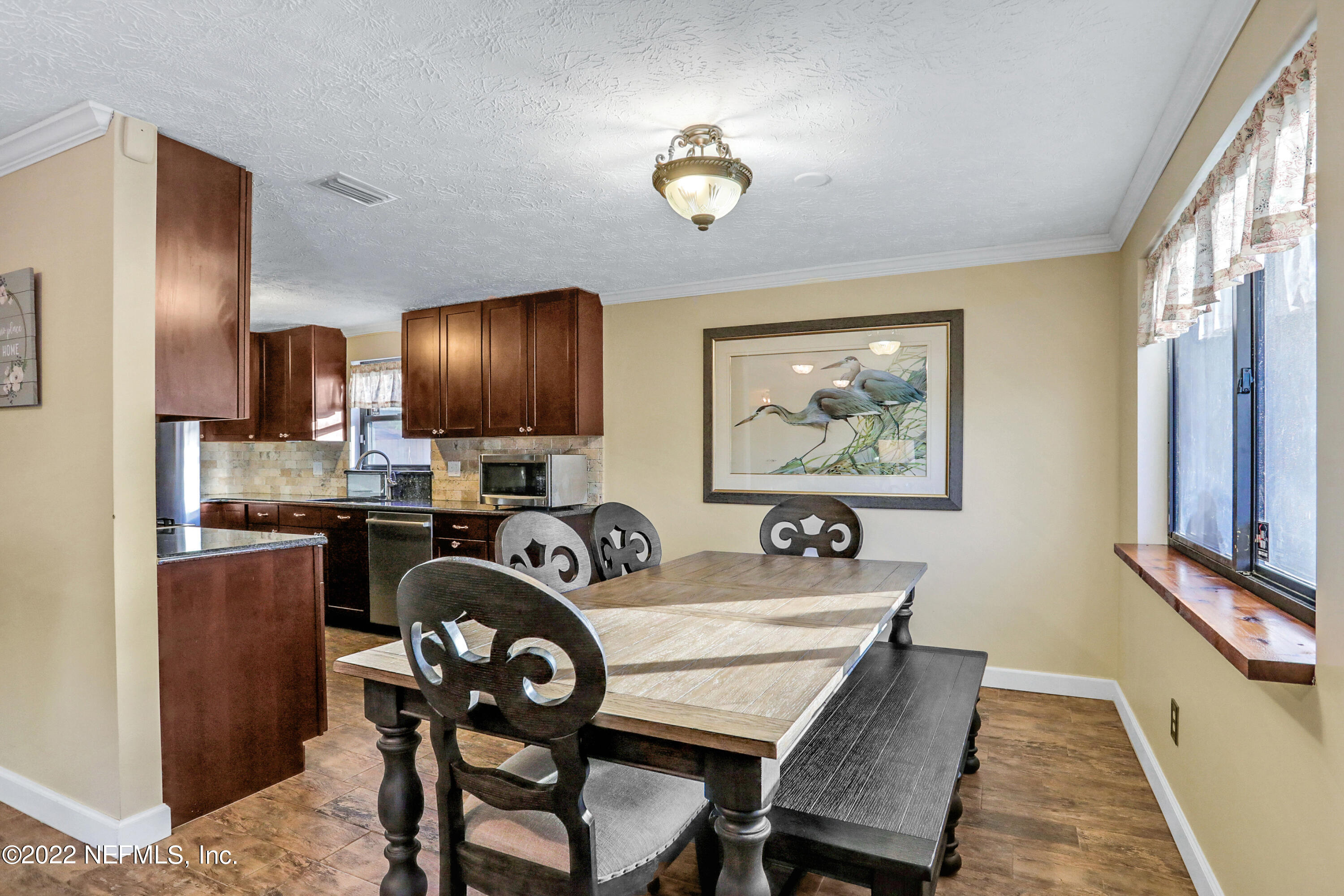 2198 Carter Braxton Road Orange Park, FL 32073 - Photo 18 of 33 a view of a dining room with furniture
