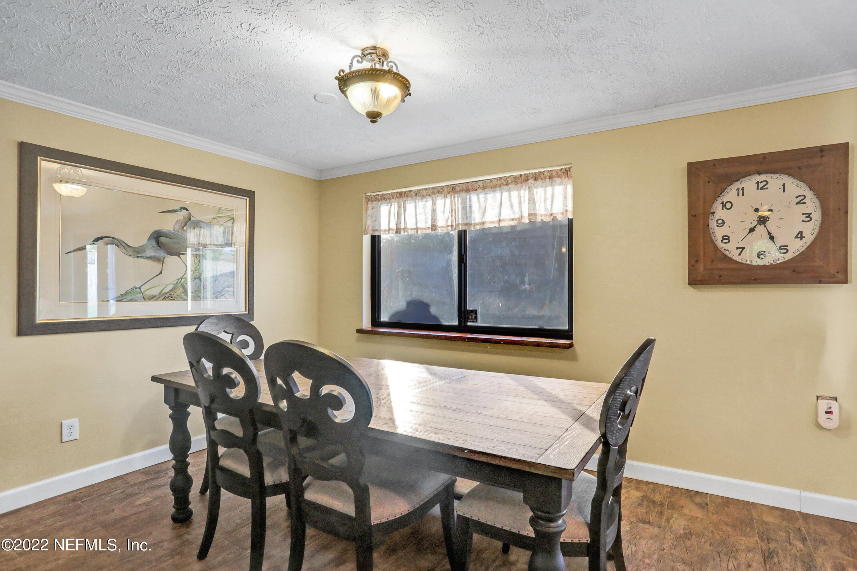 2198 Carter Braxton Road Orange Park, FL 32073 - Photo 19 of 33 a dining room with furniture and window