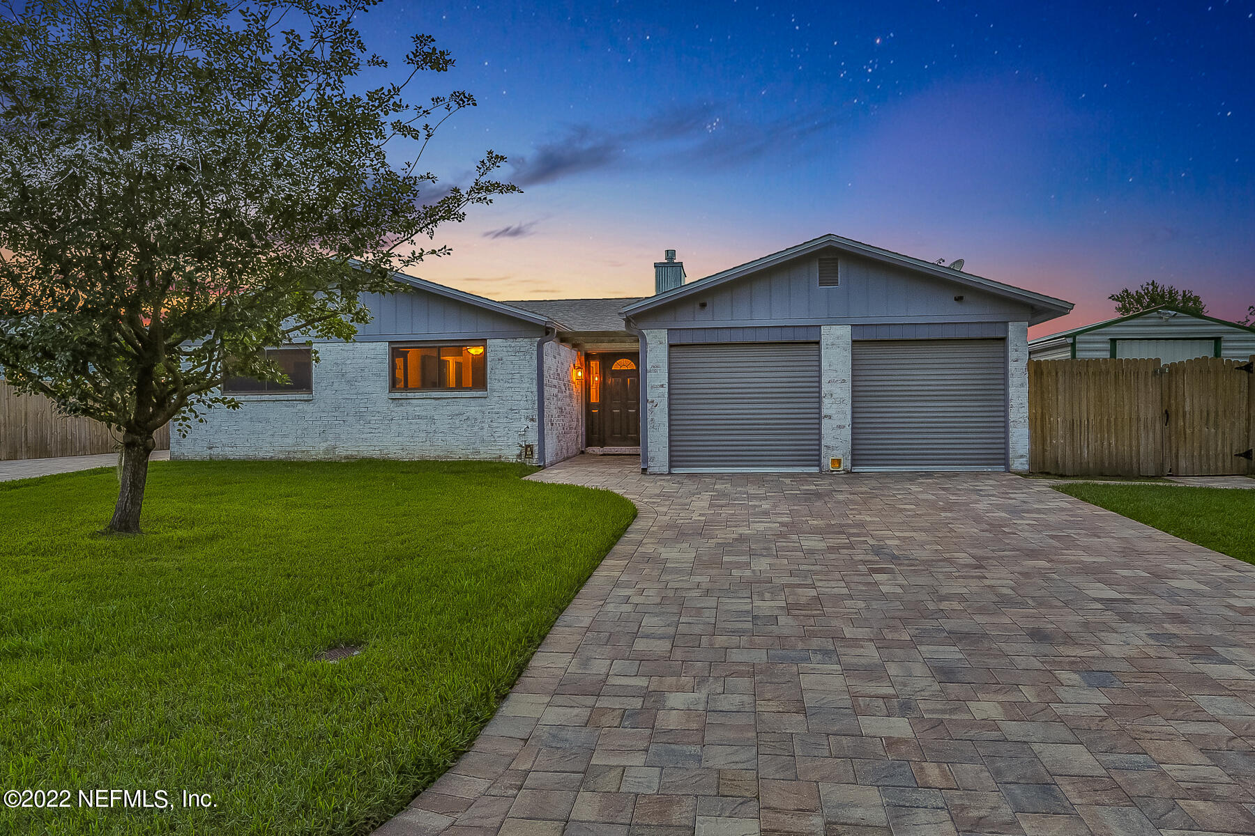 2198 Carter Braxton Road Orange Park, FL 32073 - Photo 2 of 33 a front view of a house with a garden