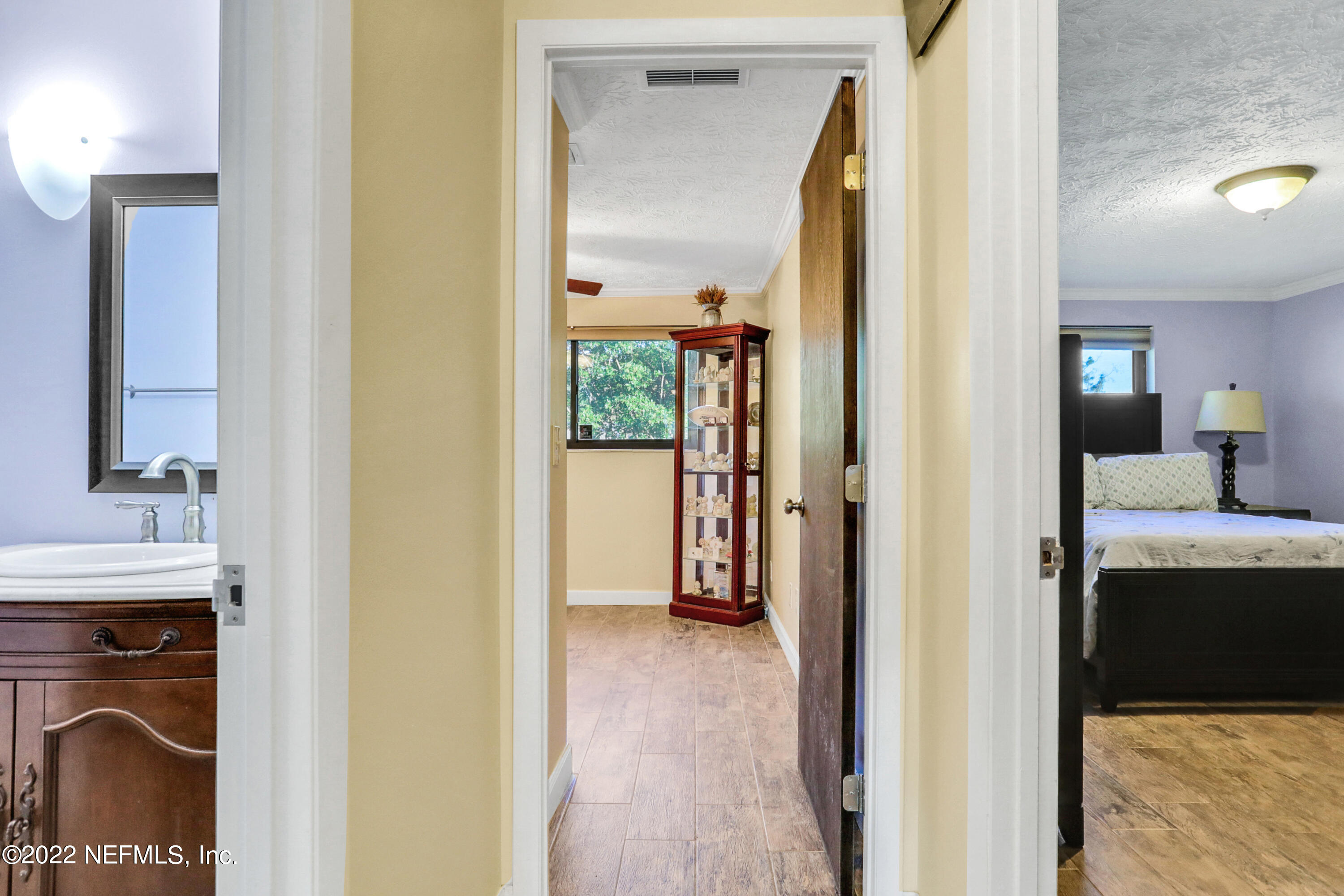 2198 Carter Braxton Road Orange Park, FL 32073 - Photo 28 of 33 a view of a bathroom from a hallway